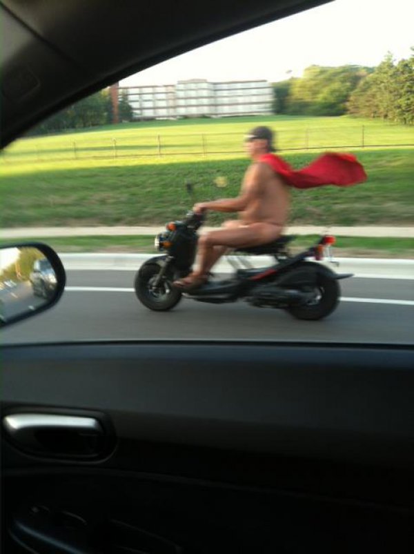 Superman is not the same (naked man in a raincoat on a scooter)